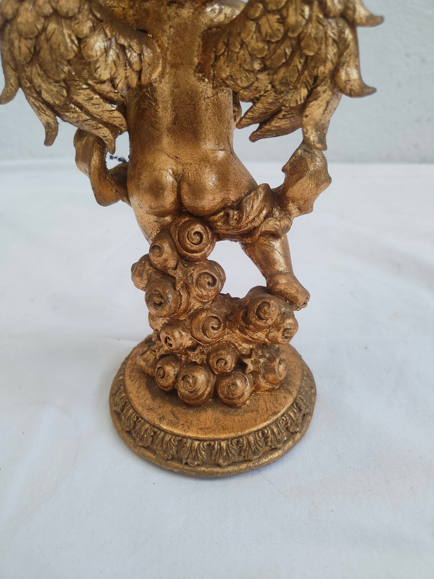 Portacandele rialzina putto dorato in legno e gesso