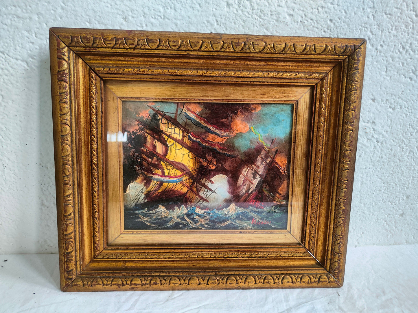 Quadro a dipinto con cornice dorata navi in mare