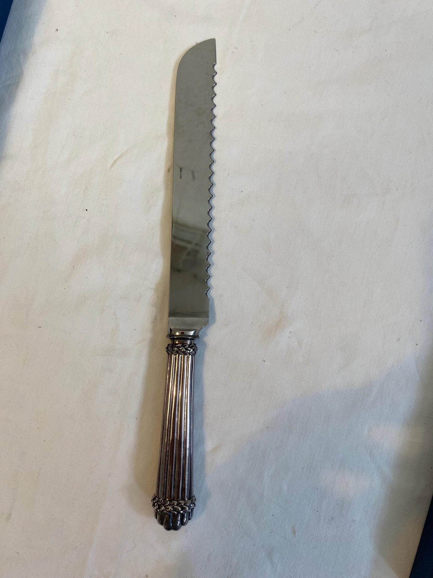 Coltello da torta G. Raspini in argento 925 manico cesellato 29 cm con scatola originale e libretto cura