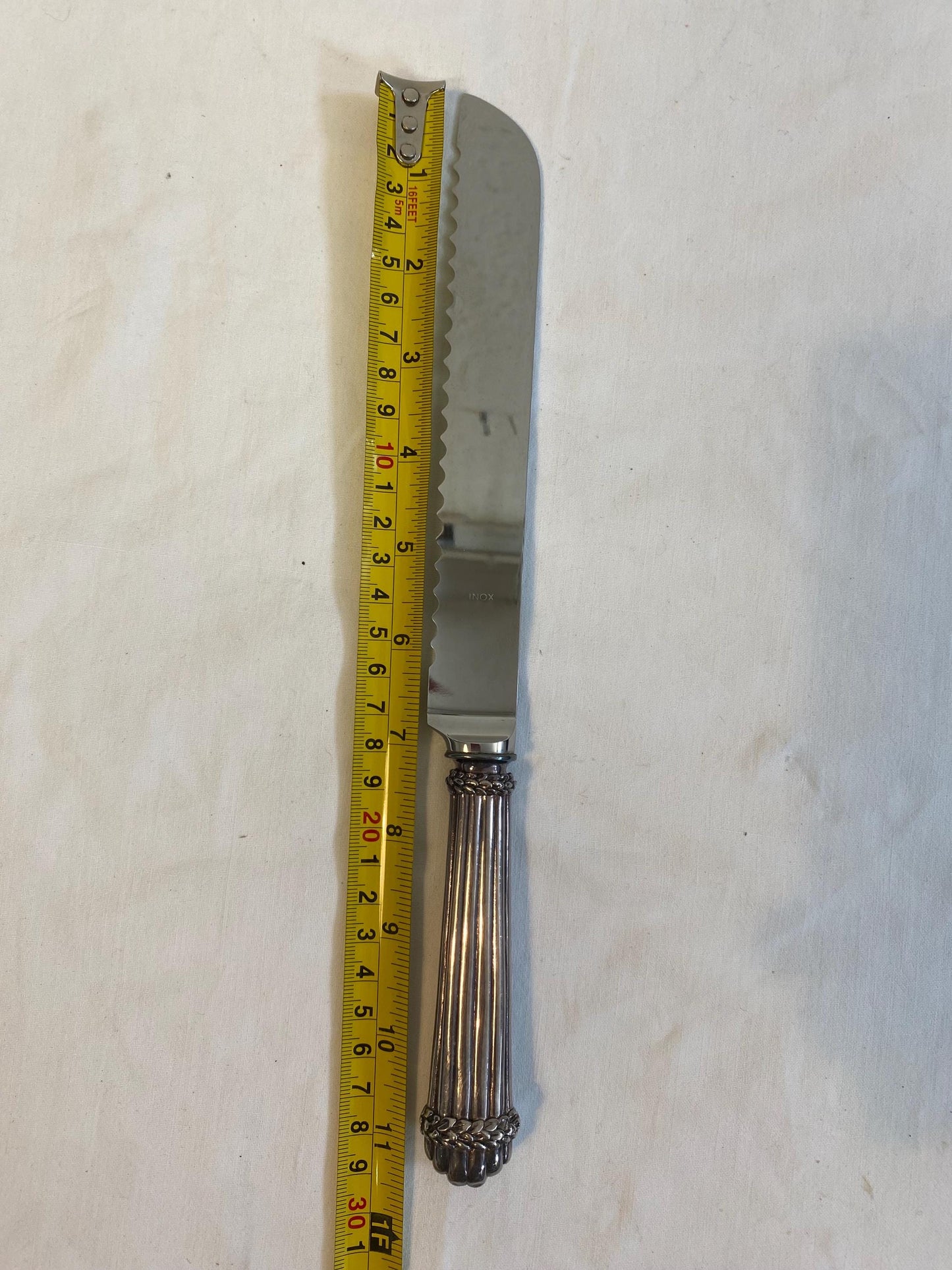 Coltello da torta G. Raspini in argento 925 manico cesellato 29 cm con scatola originale e libretto cura