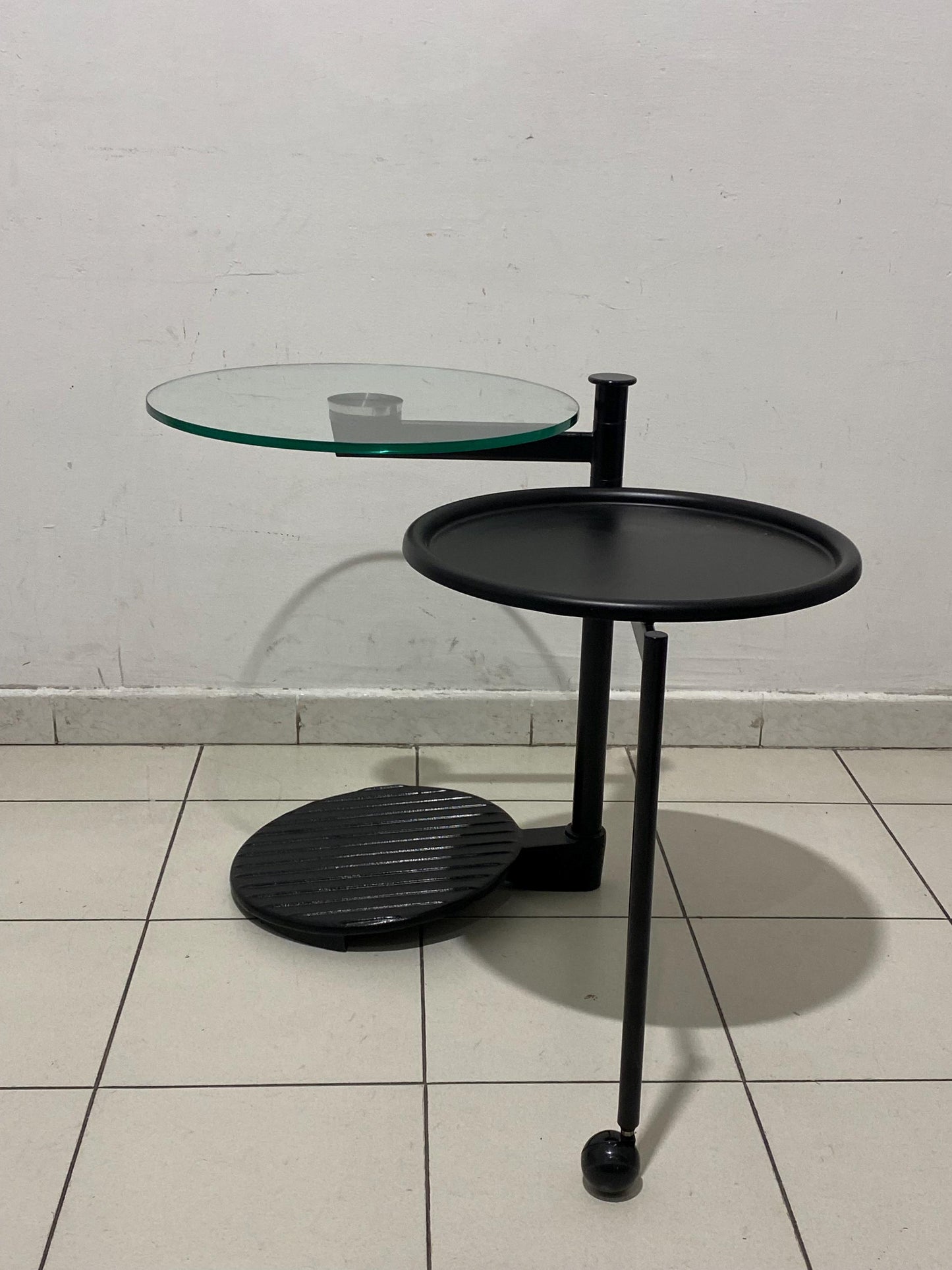 Vintage industrial design coffee table with rotatable glass top Ø45cm h60cm, black metal frame with wheel - 1980s Modern