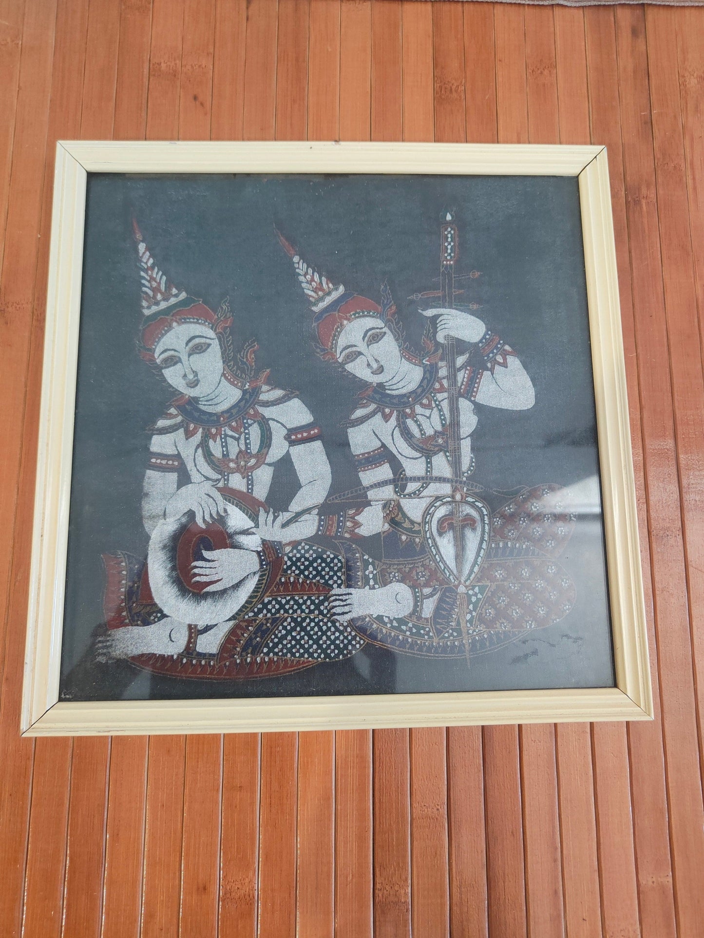 quadro stampo  su tessuto raffigurante due musiciste tailandesi
