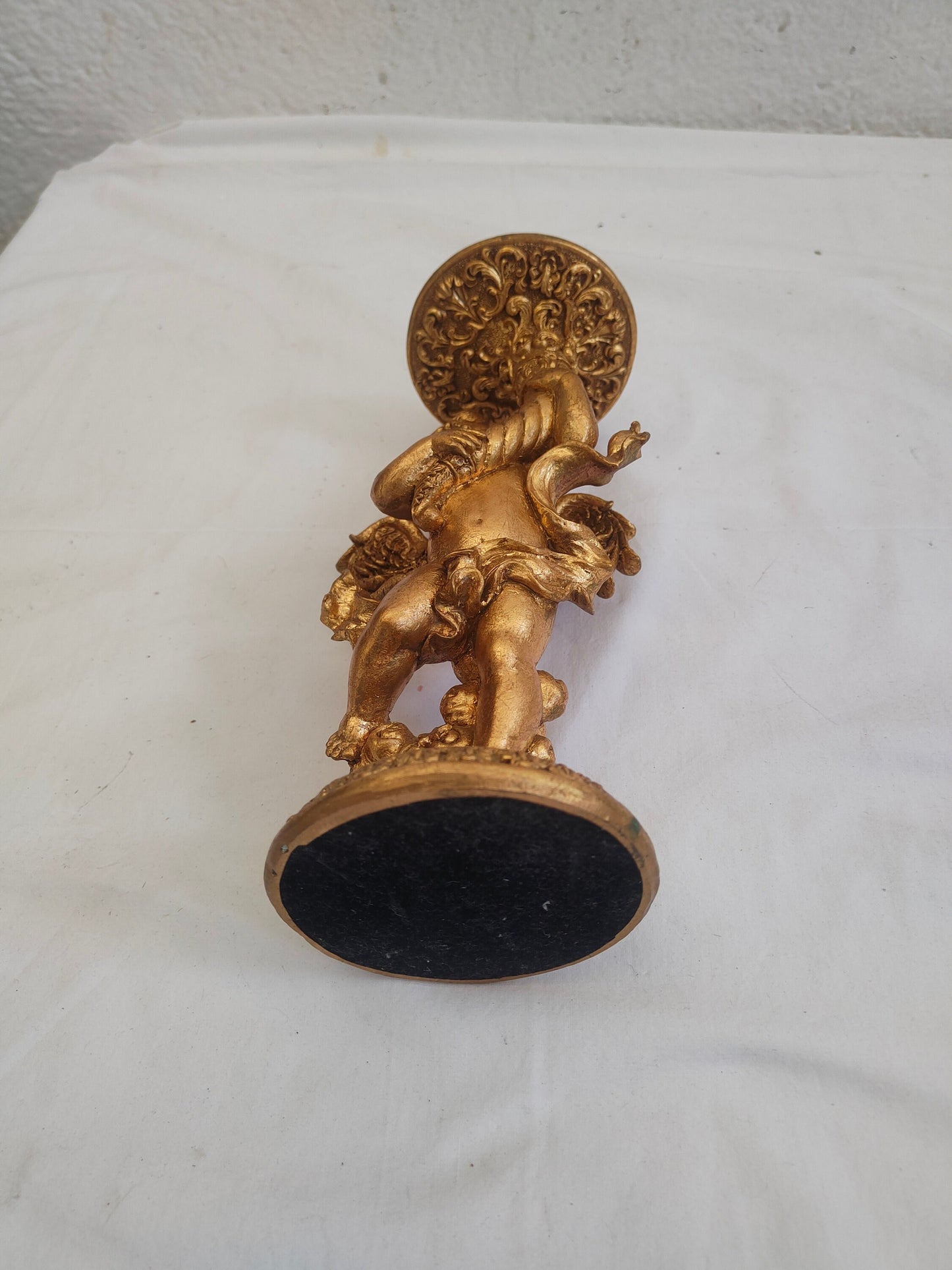 Portacandele rialzina putto dorato in legno e gesso