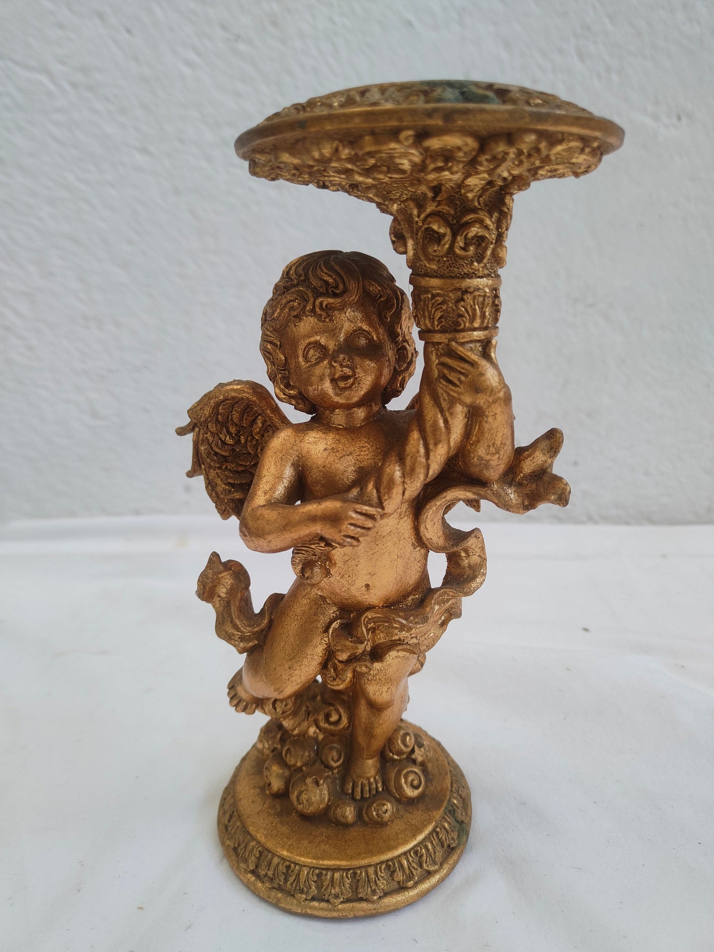 Portacandele rialzina putto dorato in legno e gesso