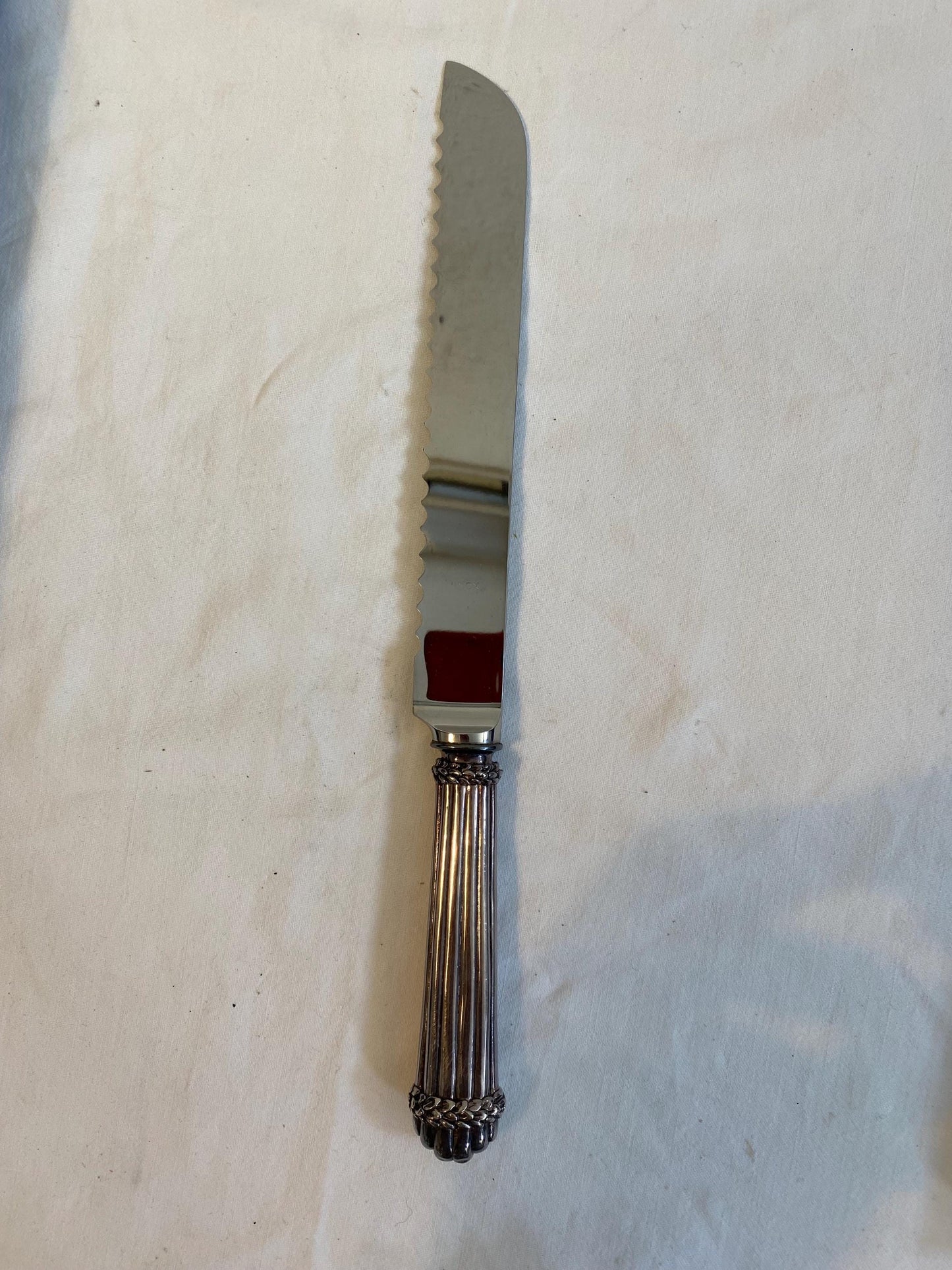 Coltello da torta G. Raspini in argento 925  manico cesellato 29 cm  con scatola originale e libretto cura