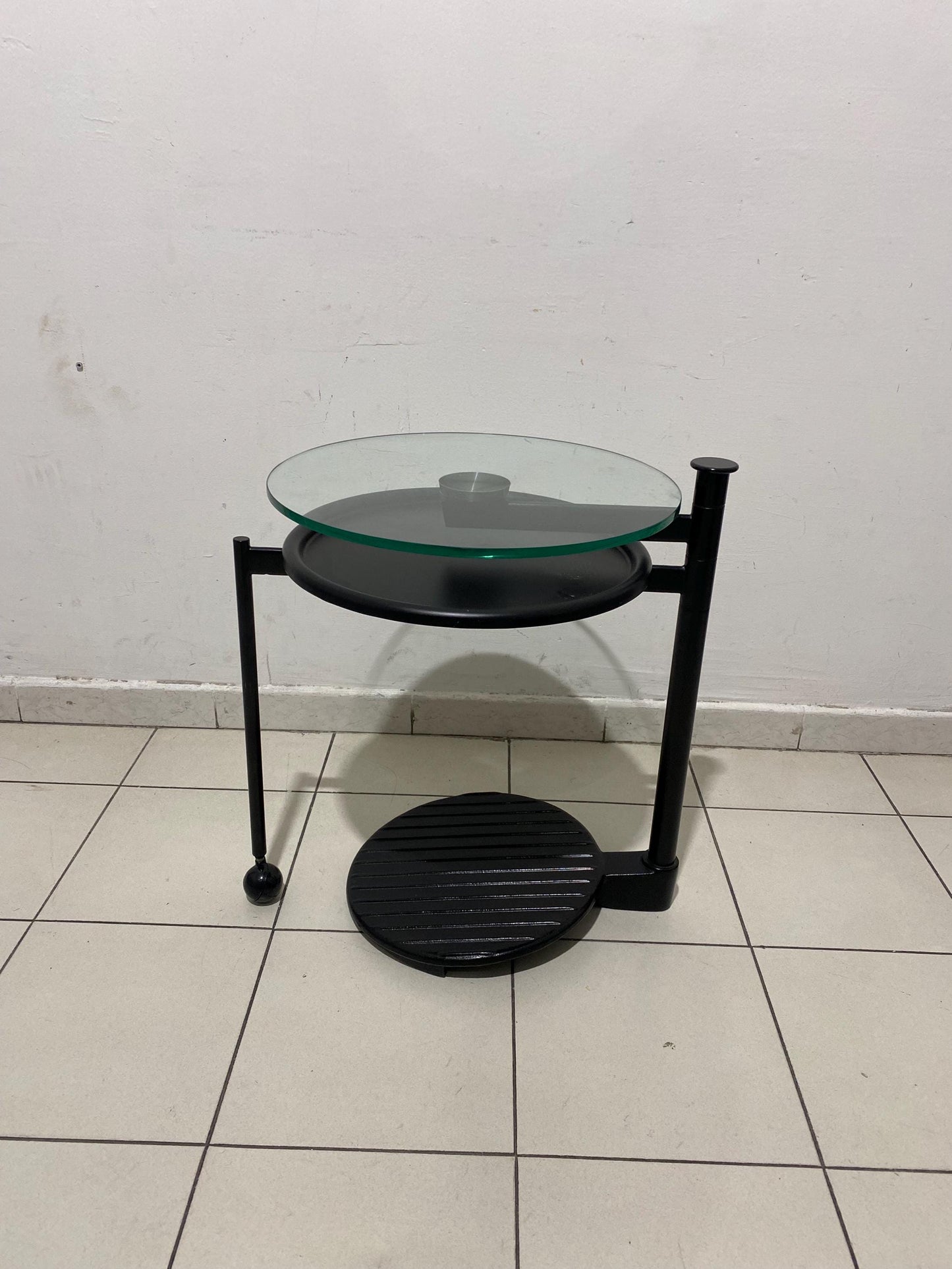 Vintage industrial design coffee table with rotatable glass top Ø45cm h60cm, black metal frame with wheel - 1980s Modern