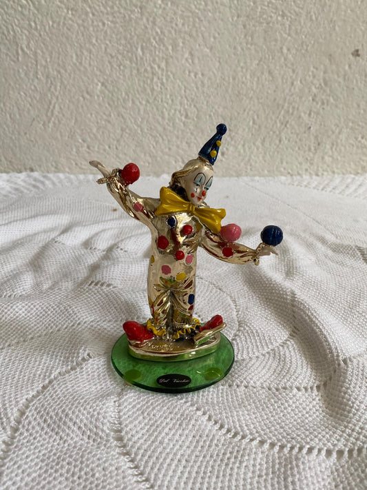Clown giocoliere in ceramica smaltata argento Del Vecchio, firmato a mano, base in vetro verde, vintage 15 cm da collezione rara circo