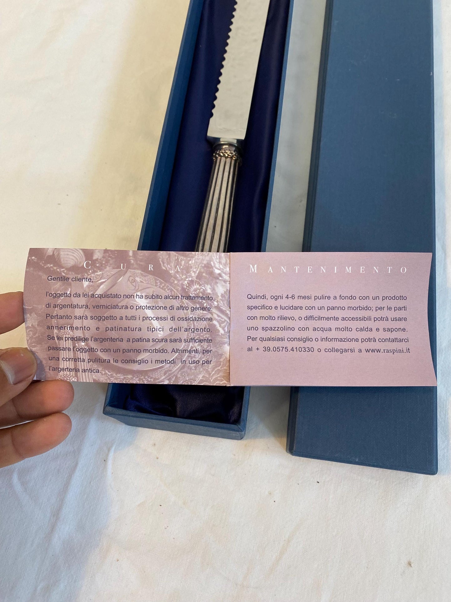 Coltello da torta G. Raspini in argento 925  manico cesellato 29 cm  con scatola originale e libretto cura