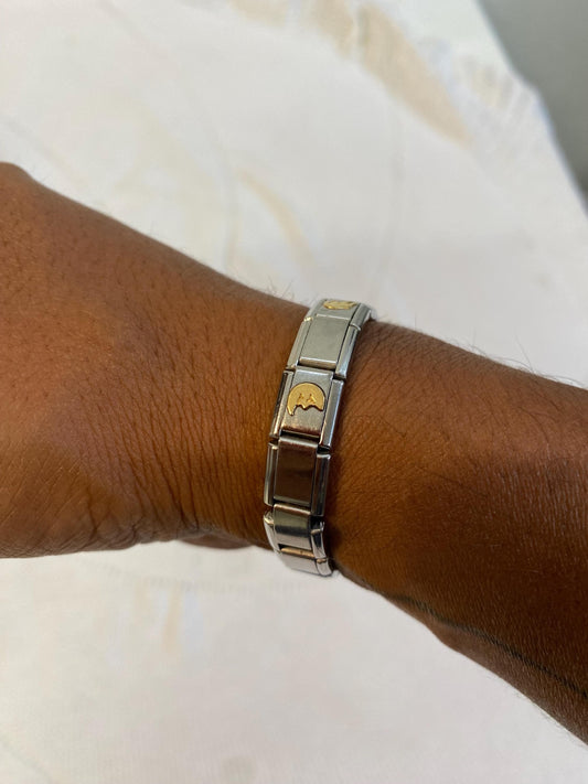 Bracciale vintage unisex elastico in acciaio con rilievi dorati e motivi geometrici  diametro 5 cm anni '90