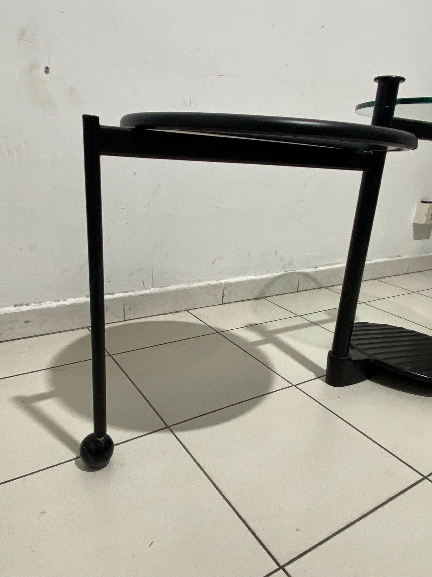 Vintage industrial design coffee table with rotatable glass top Ø45cm h60cm, black metal frame with wheel - 1980s Modern